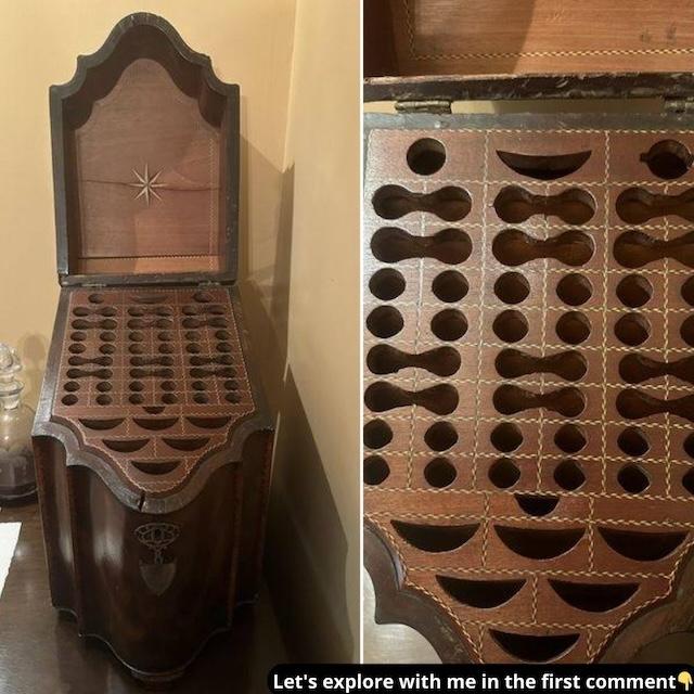 A Georgian-era walnut knife box with an elegant star inlay and multiple cutlery compartments