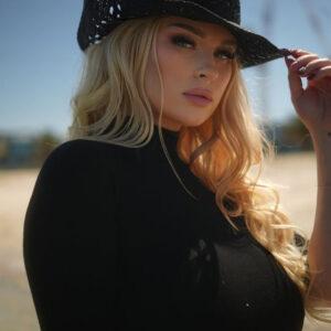 Chloe Michelle radiates effortless elegance, embodying the vibrant spirit of Melbourne’s creative pulse.